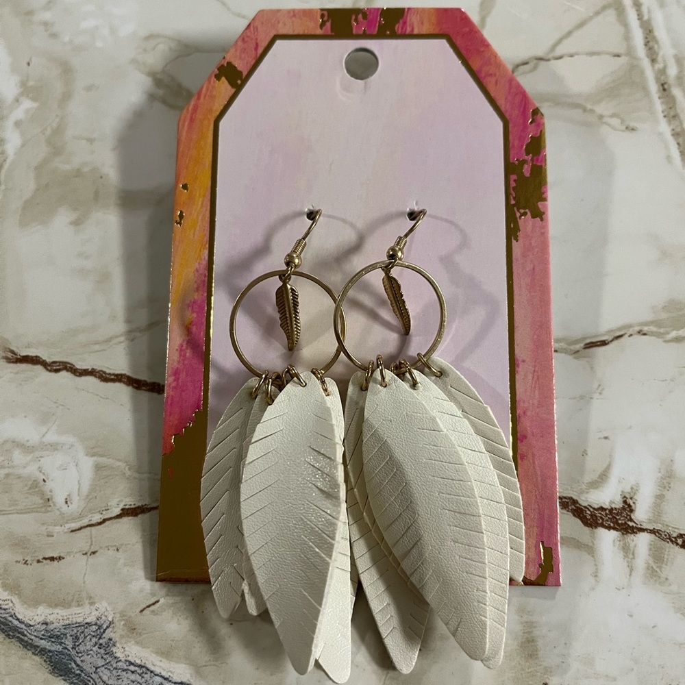 Boutique Faux Leather Leaf Stamped Tassel Earrings in White